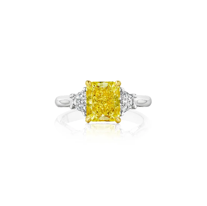 Fink's Exclusive Platinum Radiant Cut Fancy Yellow Diamond Engagement Ring